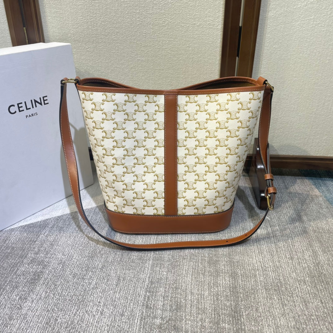 CELINE BUCKET 33 IN WHITE TRIOMPHE CANVAS AND BRONZE BROWN CALFSKIN TRIM