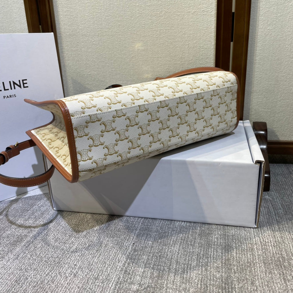 CELINE 25S HORIZONTAL CABAS 34MM IN WHITE TRIOMPHE CANVAS AND BROWN CALFSKIN