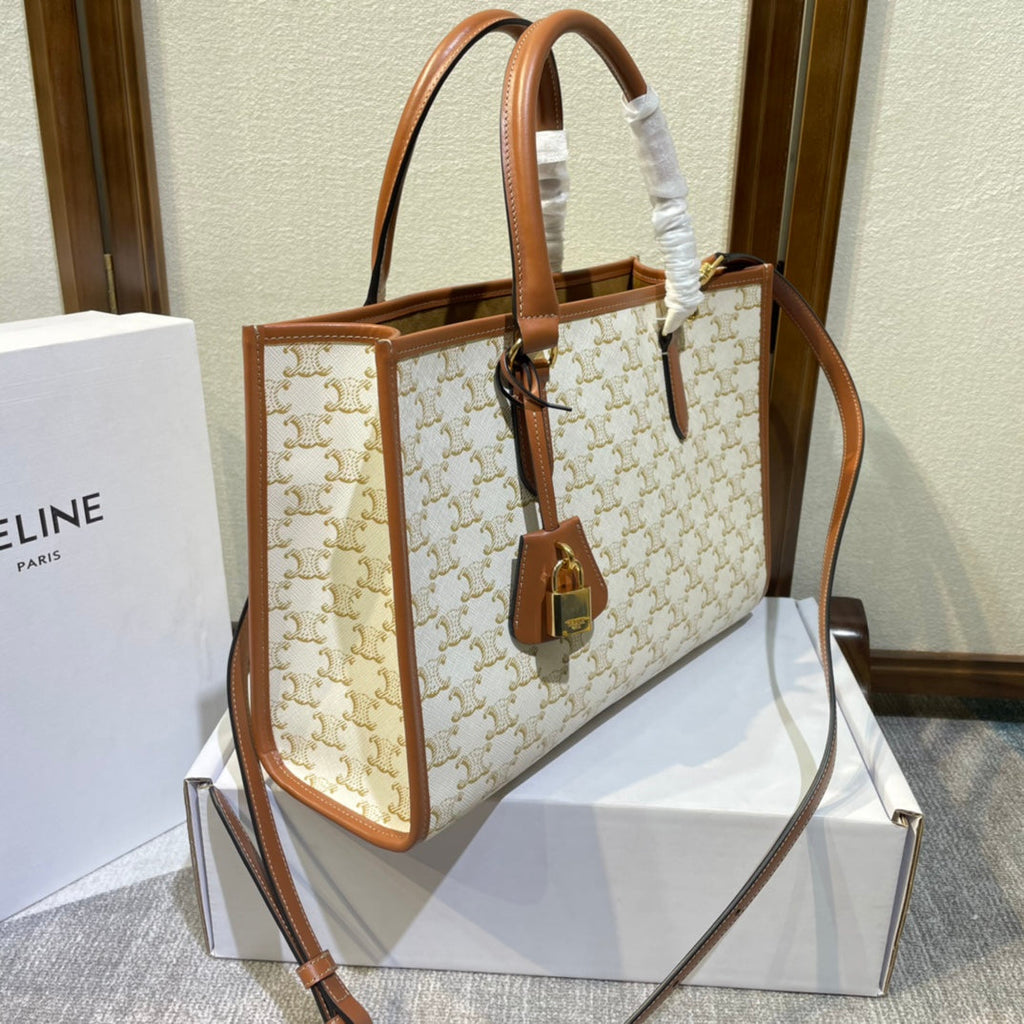 CELINE 25S HORIZONTAL CABAS 34MM IN WHITE TRIOMPHE CANVAS AND BROWN CALFSKIN