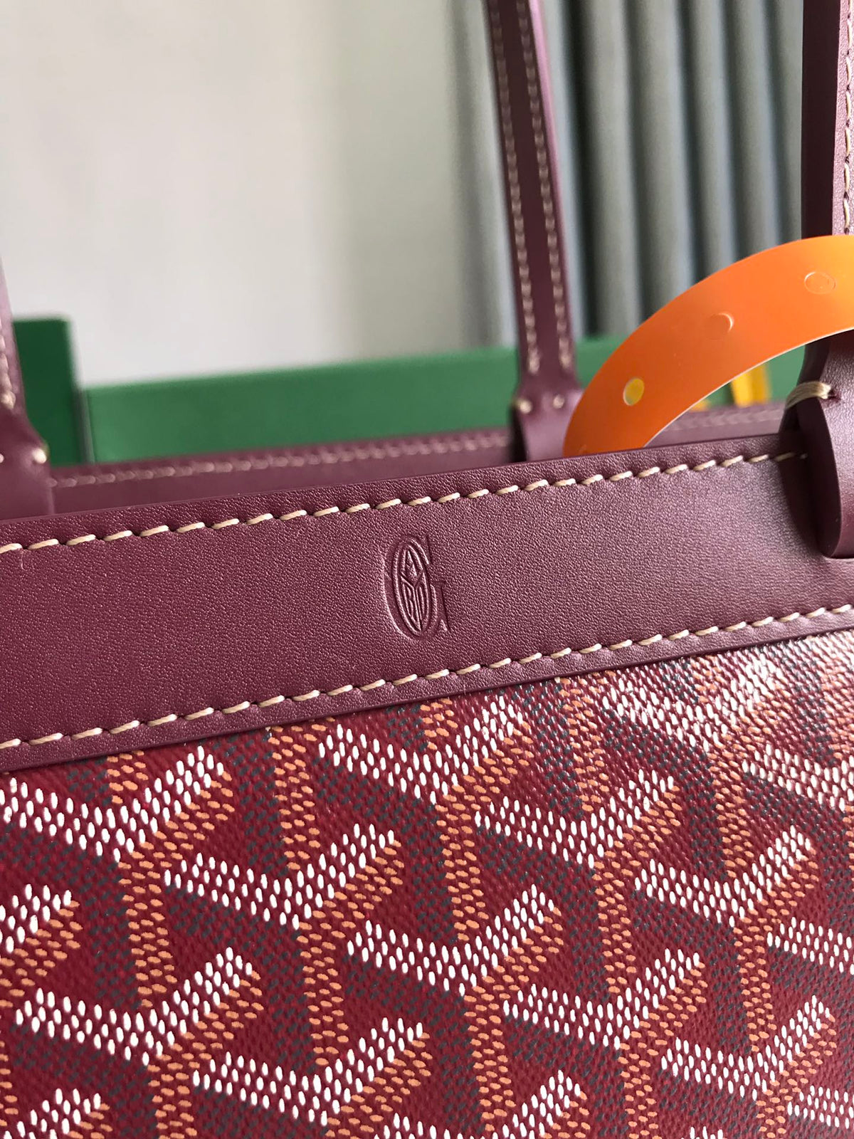 BELLECHASSE BIAUDE PM BAG 36 IN WINE RED GOYARDINE CANVAS AND CALFSKIN TRIM