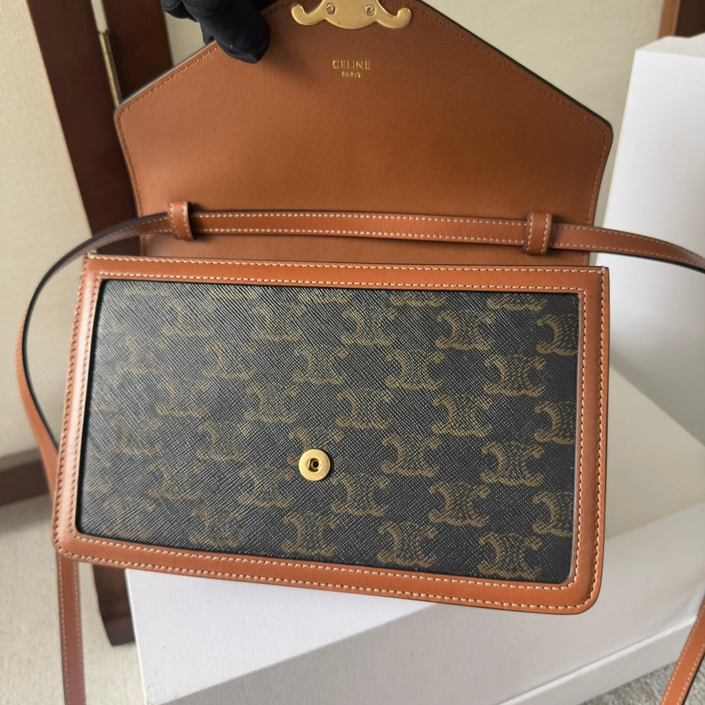 CELINE 25S WALLET MARGO 22MM IN BLACK TRIOMPHE CANVAS AND BROWN CALFSKIN
