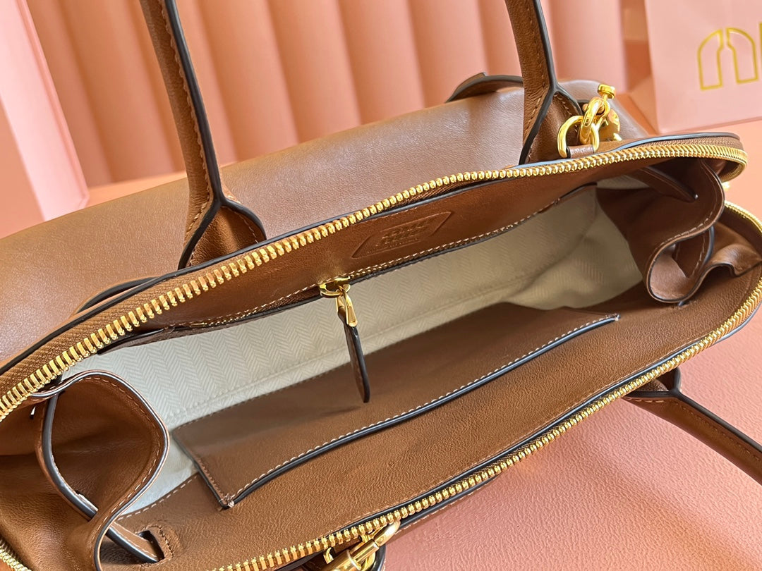 AVENTURE NAPPA BAG 33 IN CARAMEL BROWN LAMBSKIN GOLD HARDWARE