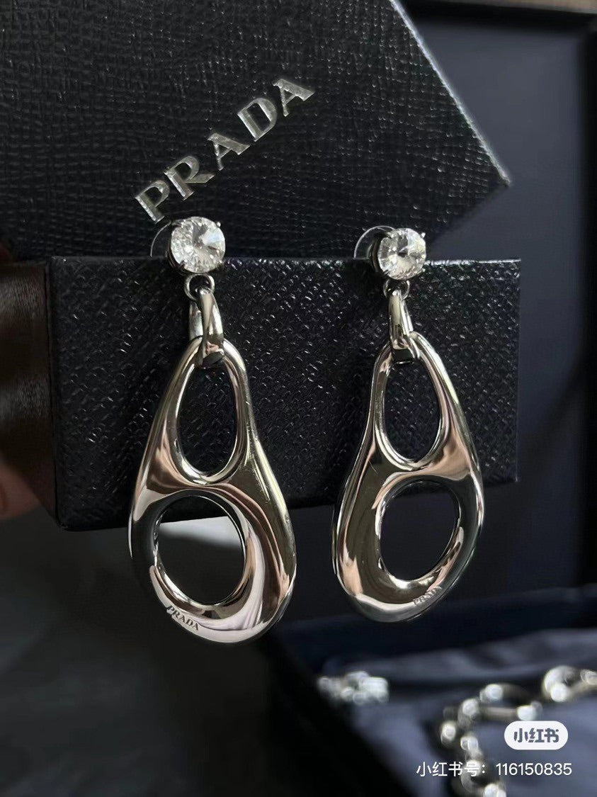 18K Prada Inverted Triangle Earrings