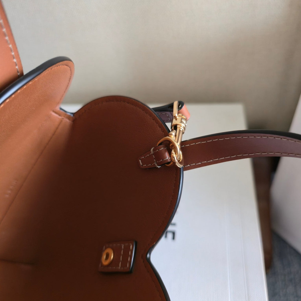 CELINE 25S TEEN COEUR BAG 19 MM IN BLACK TRIOMPHE CANVAS AND TAN CALFSKIN