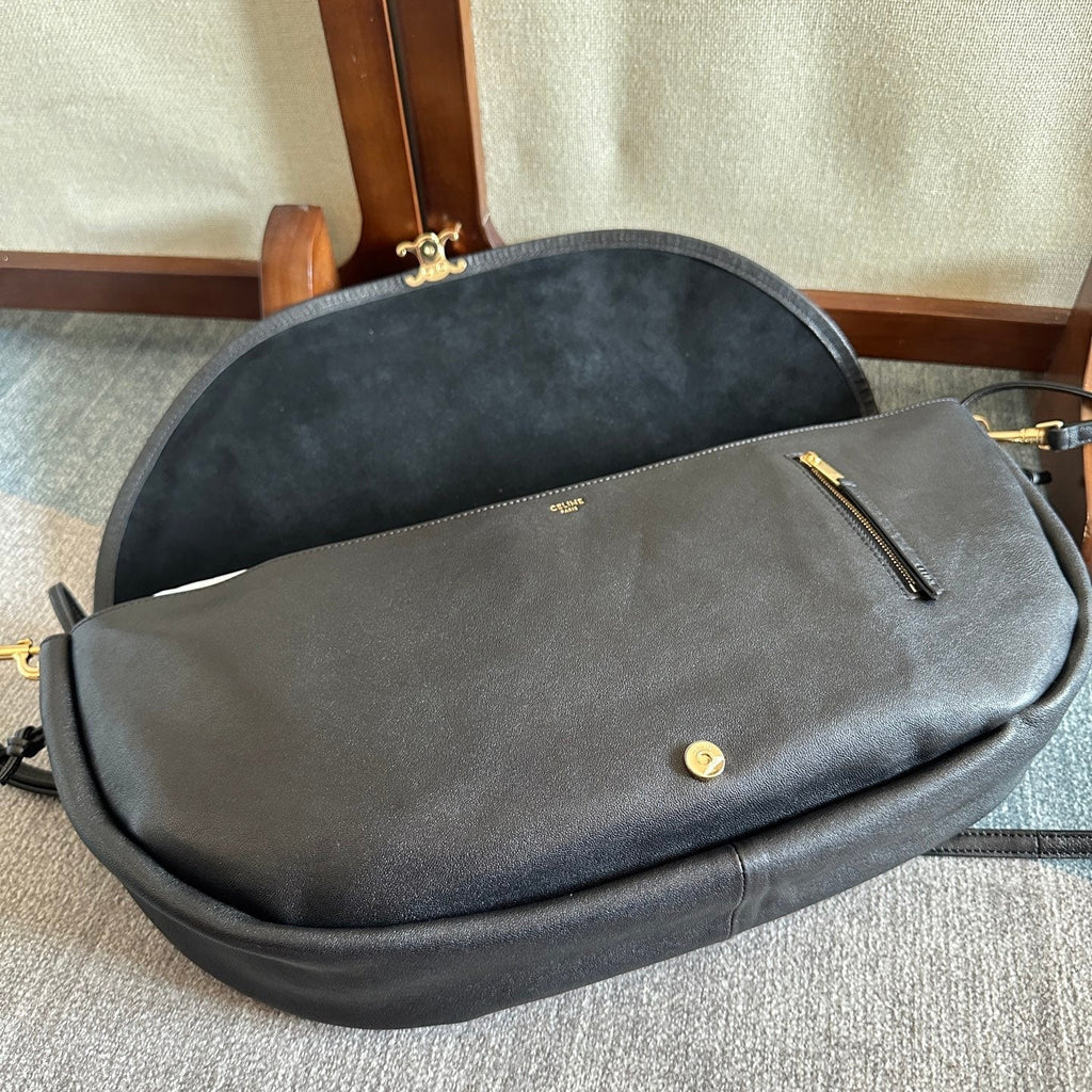 CELINE 25S HALFMOON SOFT TRIOMPHE BAG 46MM IN BLACK SUPPLE SHINY LAMBSKIN