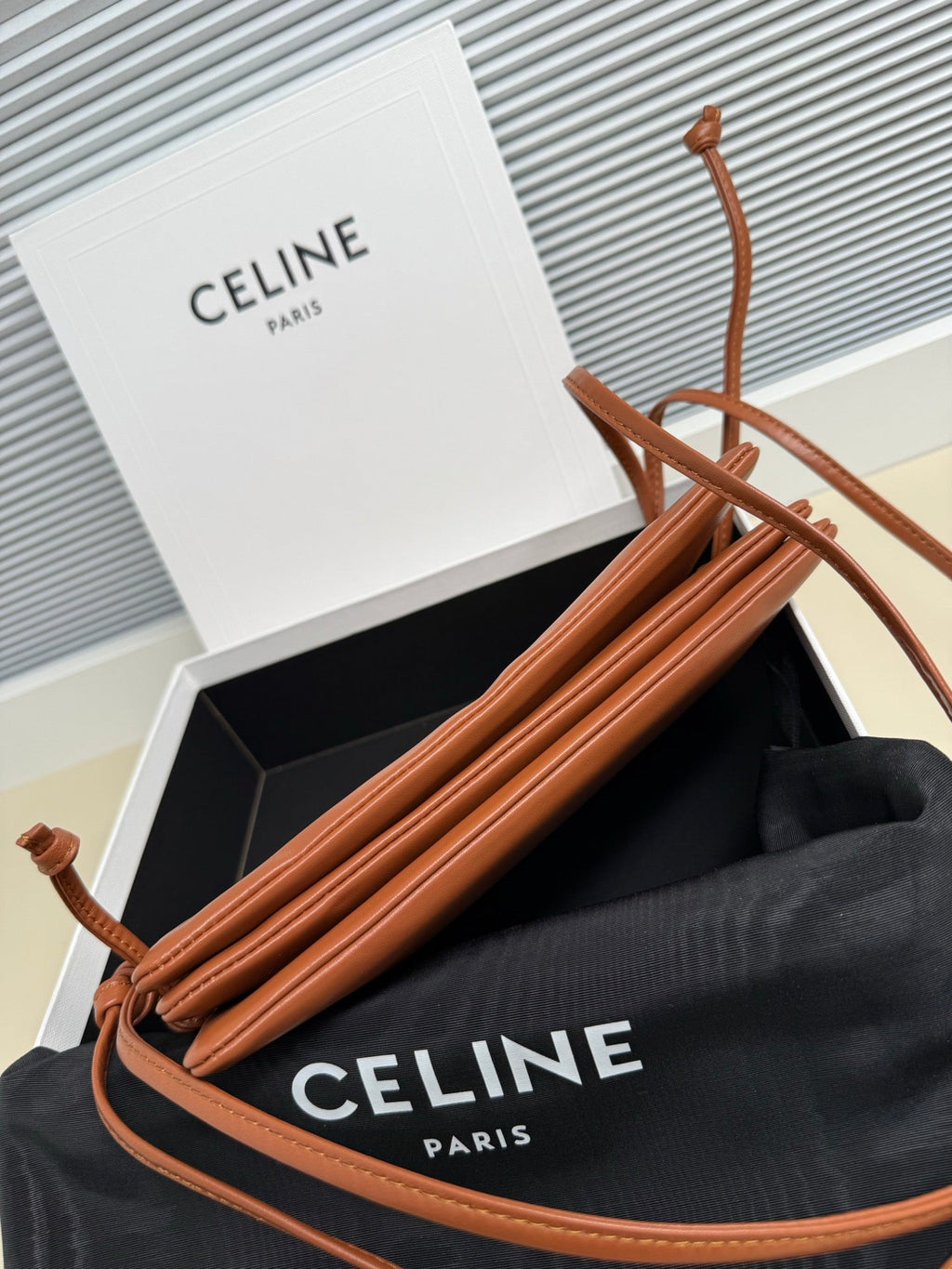 CELINE 25S TRIO FLAP 22MM IN BURNT ORANGE SMOOTH LAMBSKIN GOLD HARDWARE