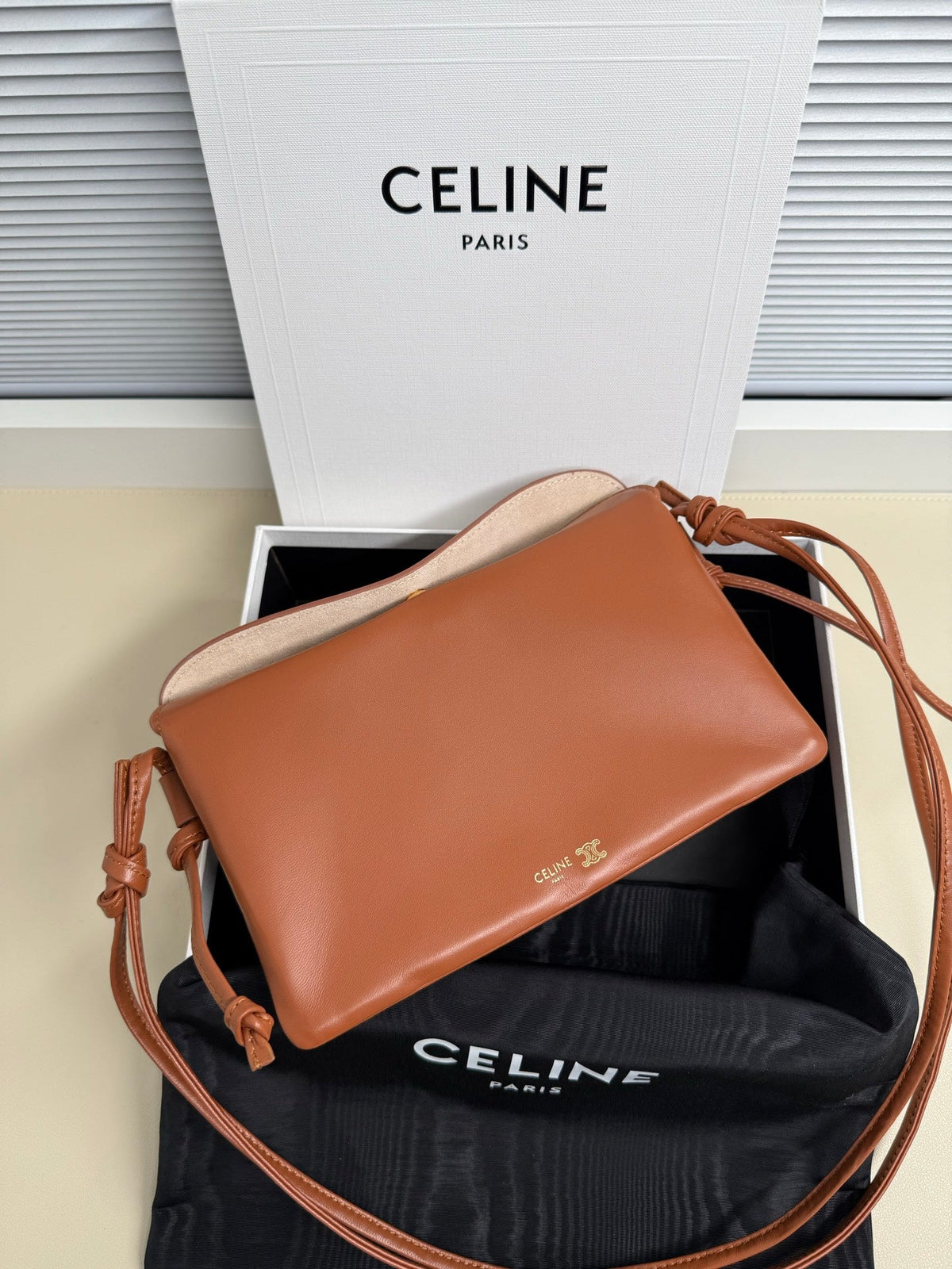 CELINE 25S TRIO FLAP 22MM IN BURNT ORANGE SMOOTH LAMBSKIN GOLD HARDWARE