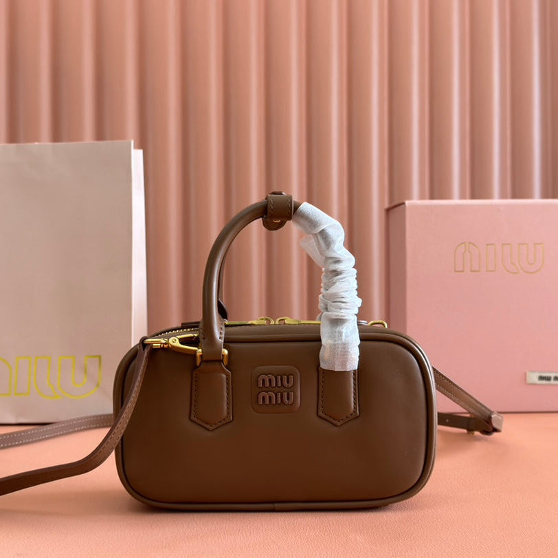 ARCADIE BAG 19 IN TAWNY BROWN SHINY CALFSKIN