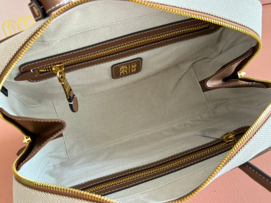 BOWLING BAG 28 IN WHITE CANVAS AND BROWN CALFSKIN TRIM