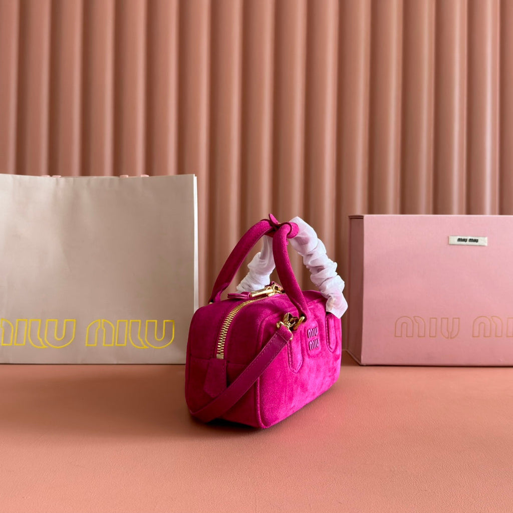 ARCADIE BAG 22 IN FUCHSIA SUEDE GOLD HARDWARE